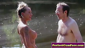 Busty Femdom Gives Handjob To Guy Outdoors