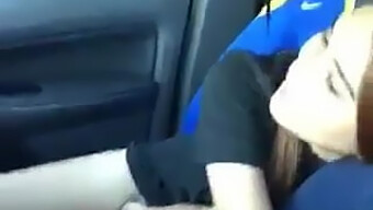 Asian Girl Rides In A Car